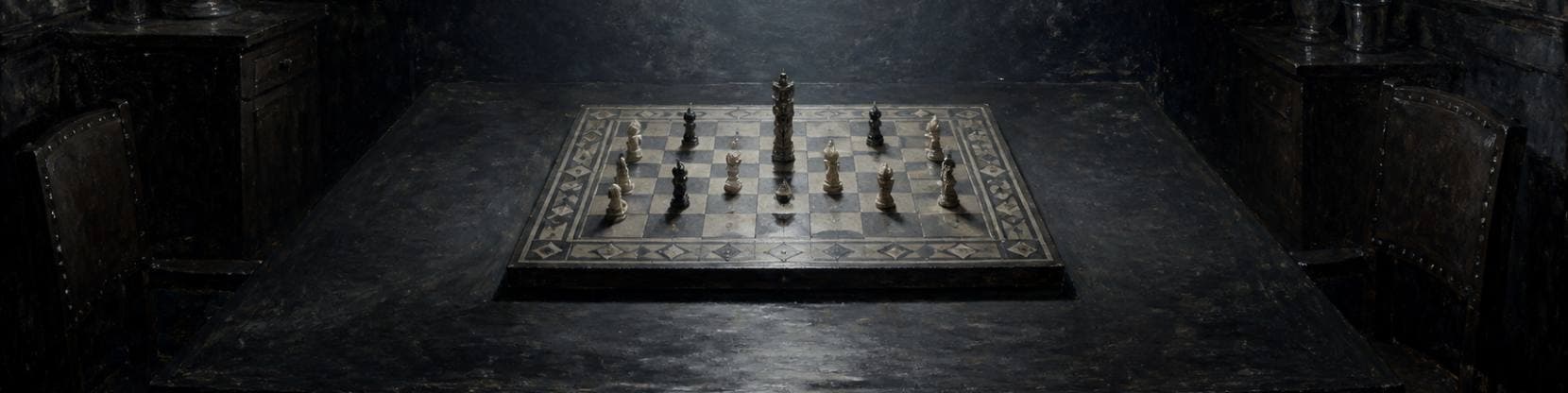 Painting of an inlaid game board set with carved pieces on a dark table, lit from above by clean cool light.